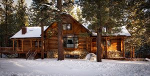 log cabin with snow